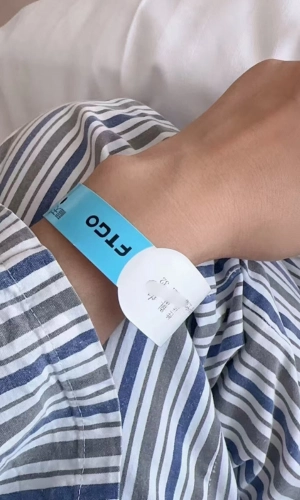 Patient wearing a wristband for display 2