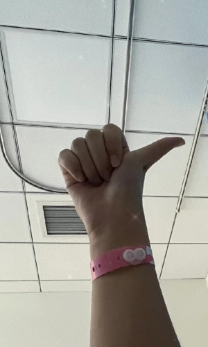 Patient wearing a wristband for display 2