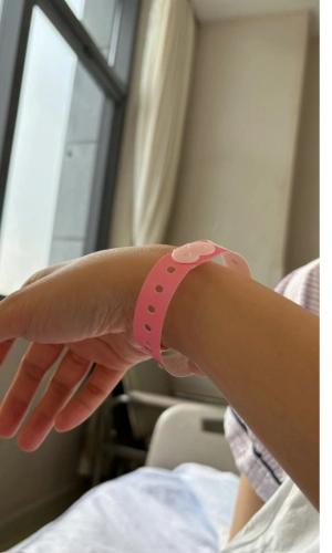 Patient wearing a wristband for display 2